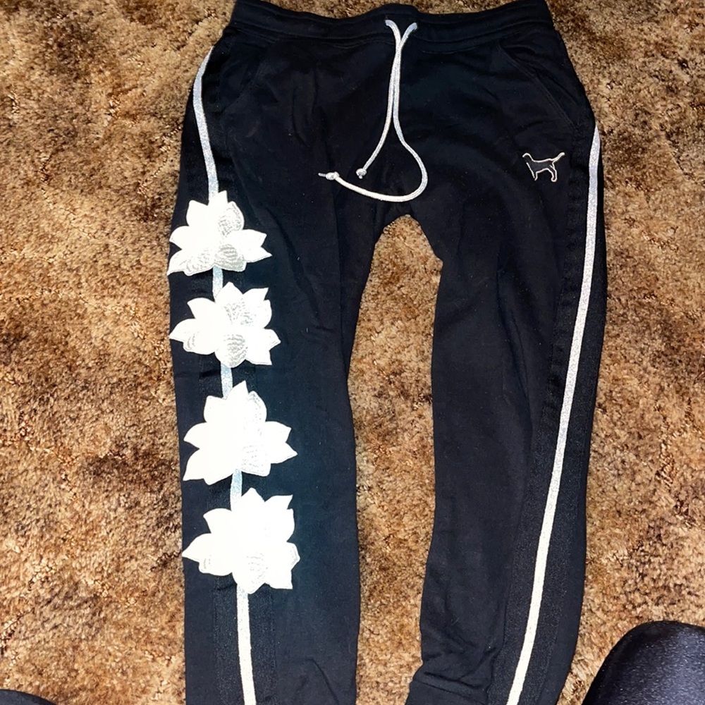 PINK joggers. Color black/w flowers on the side